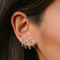 La griffe a formé 925 boucles d'oreille argentées de la CZ, rhodium a plaqué Sterling Silver Stud Earrings